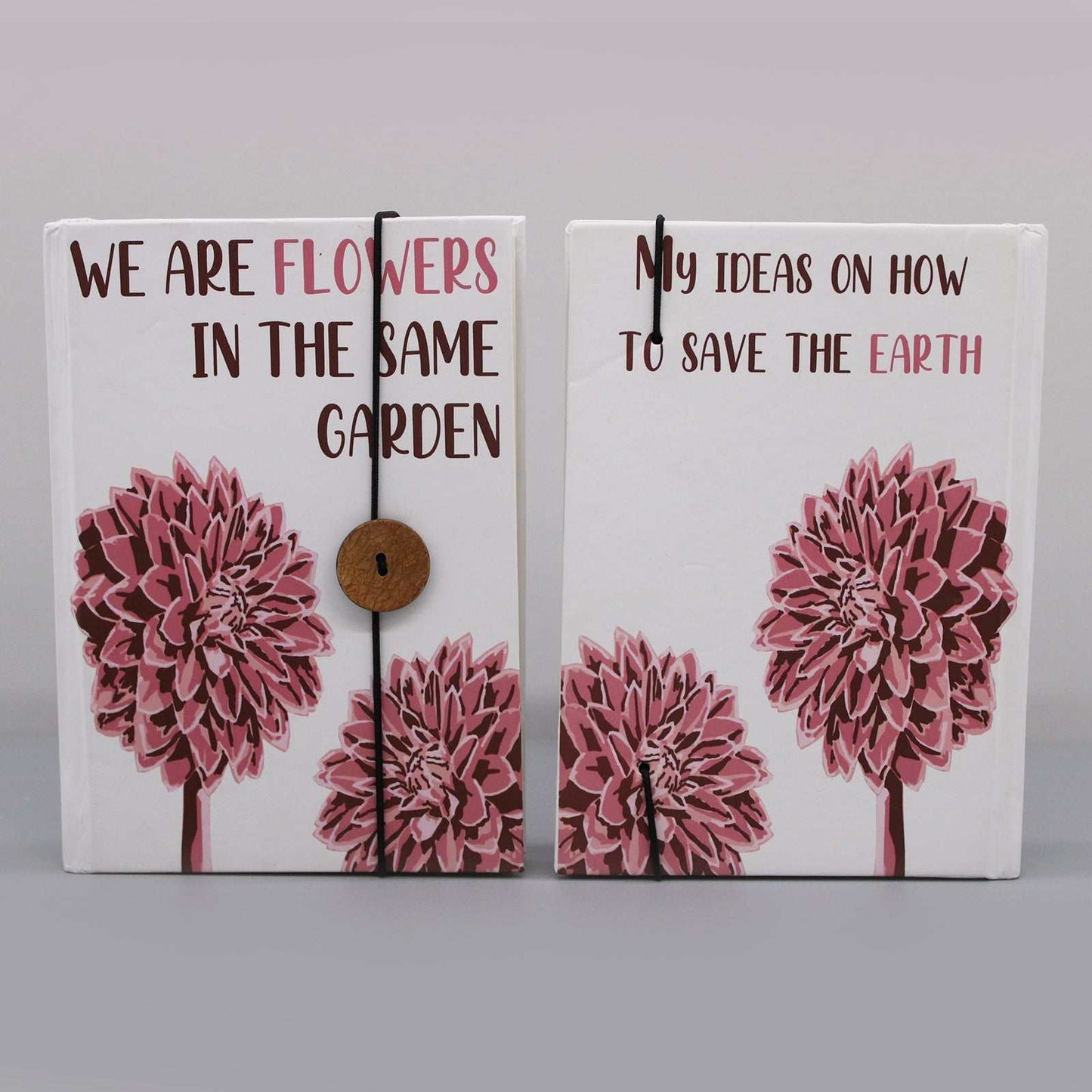 Notebook with strap featuring floral design, recycled paper, eco-friendly.