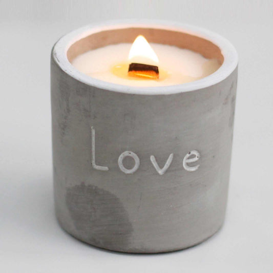 Medium concrete pot candle with wooden wick, engraved with "Love", handcrafted in a concrete vessel, purple fig & casis scent.