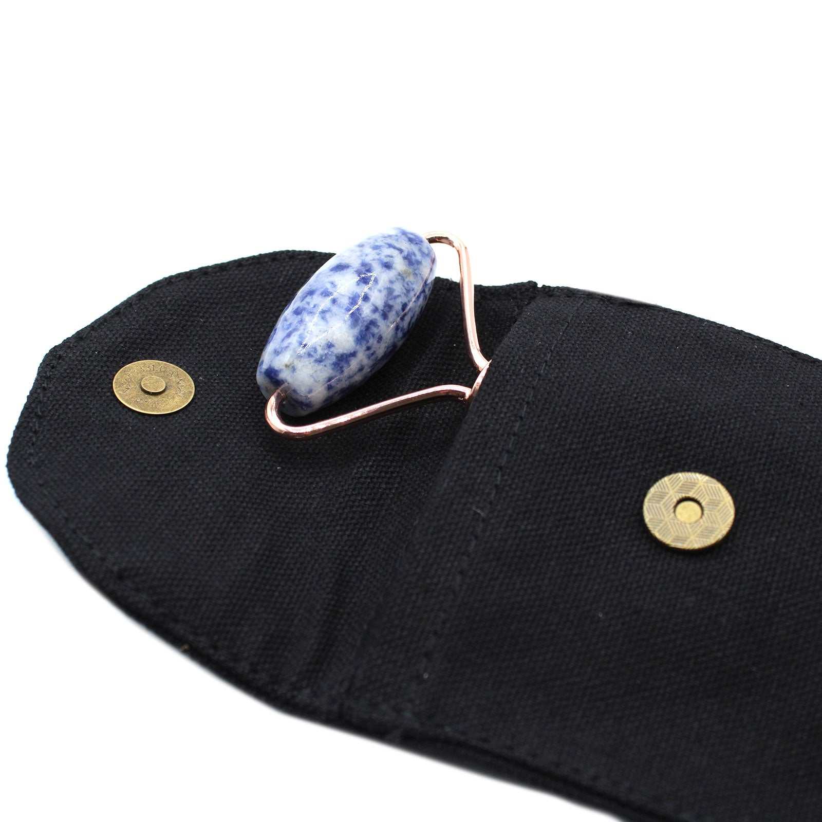 Gemstone Face Roller in Sodalite with dual ends for soothing skin and reducing puffiness.