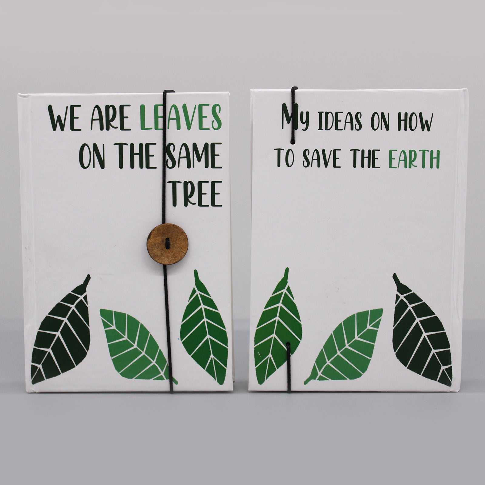 Notebook with strap featuring leaf design, recycled paper, coconut button closure.
