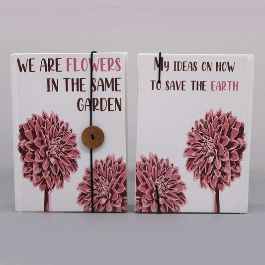 Notebook with strap featuring floral design, recycled paper, eco-friendly.