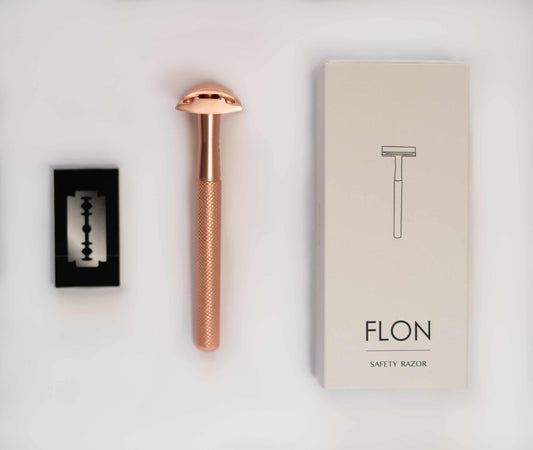 FLON Eco-friendly ReuFLON Eco-friendly Reusable Safety Razors in various colors displayed on a white surface.sable Safety Razor