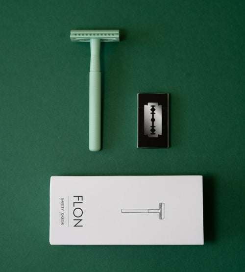 FLON Eco-friendly Reusable Safety Razors in various colors displayed on a white surface.