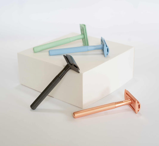 FLON Eco-friendly Reusable Safety Razors in various colors displayed on a white surface.