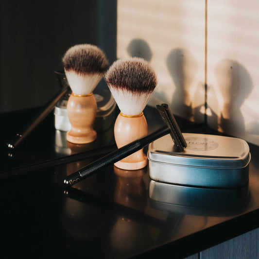 Single 2.0 Safety Razor with longer handle and unisex design on bathroom counter.