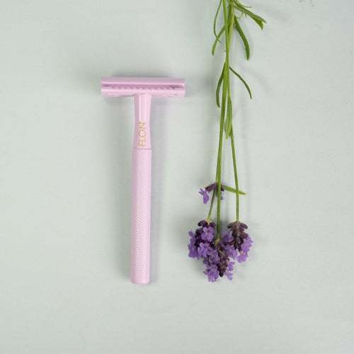 FLON Eco-friendly Reusable Safety Razors in various colors displayed on a white surface.