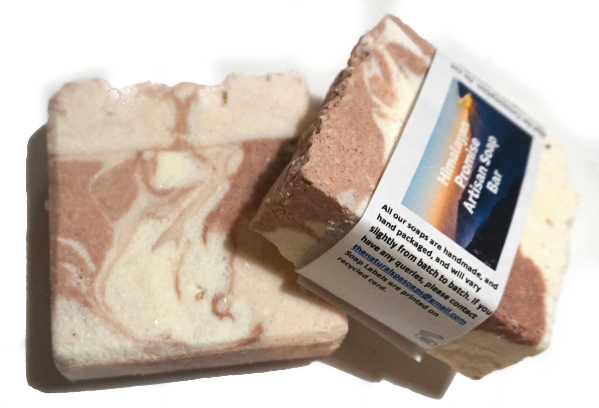 Himalayan Promise Soap BHandcrafted Natural Spa Himalayan Promise Soap Bar with lime and rosemary essence, featuring gentle exfoliation properties, displayed with rosemary sprigs.ar