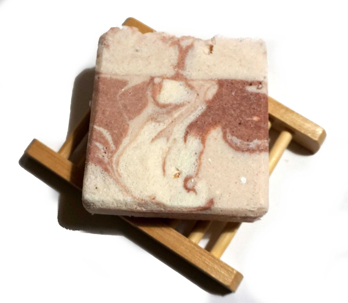 Himalayan Promise Soap BHandcrafted Natural Spa Himalayan Promise Soap Bar with lime and rosemary essence, featuring gentle exfoliation properties, displayed with rosemary sprigs.ar