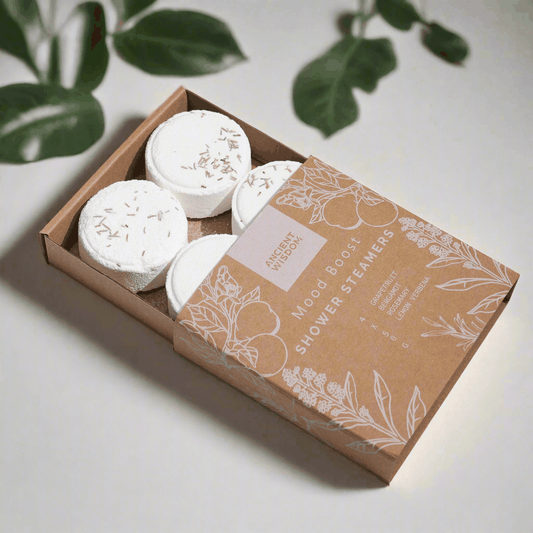 Zen Shower Steamers Therapy Wellness Gift Set displayed in an open box with natural ingredients.